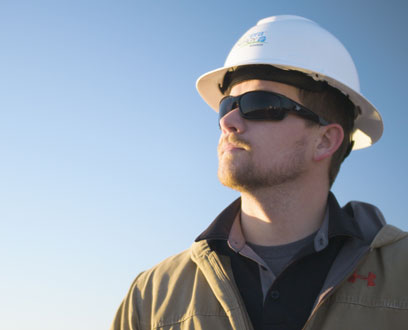 Solar energy worker using a NextEra Energy Resources hat. Solar energy worker using a NextEra Energy Resources hat.