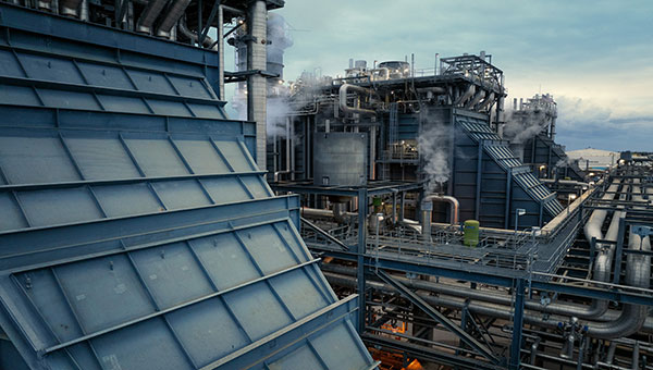 Construction worker and business man shakings hands