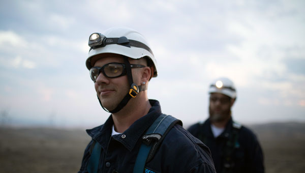 Employees in hard hats