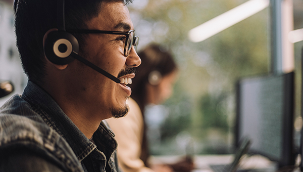 Customer service representative smiling