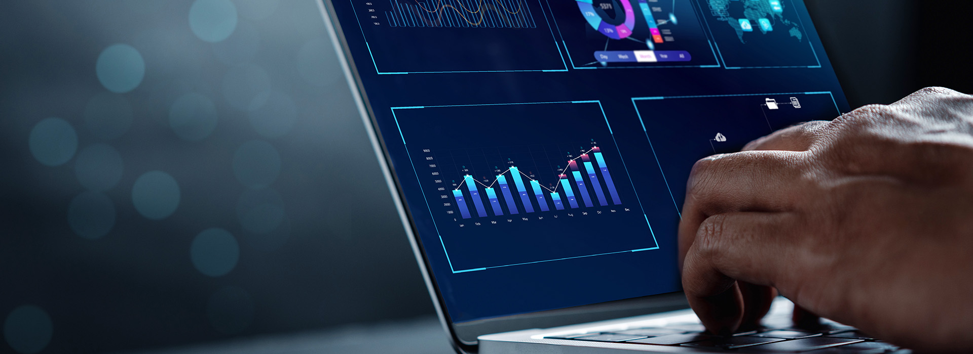 Businessman reviewing analytics data on a laptop