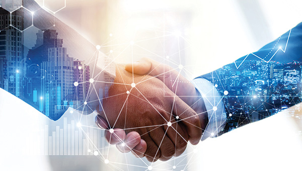 Handshake on a data analytics and cityscape background Handshake on a data analytics and cityscape background