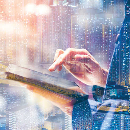 Man holding a tablet with data overlay Man holding a tablet with data overlay