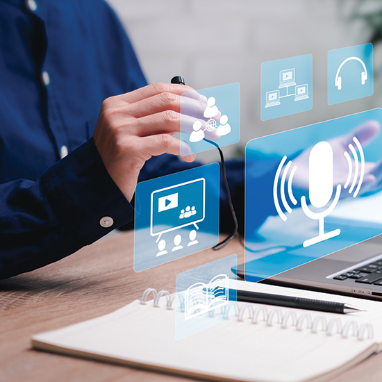 Online webinar concept with a laptop and icon overlays Online webinar concept with a laptop and icon overlays