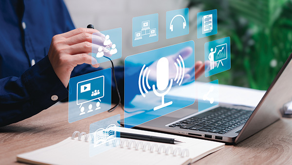 Online webinar concept with a laptop and icon overlays