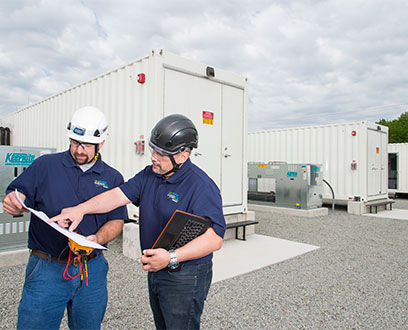 NextEra Energy Resources employees outside Green Mountain Energy Storage Site