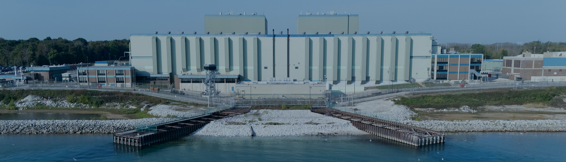 Point Beach nuclear power plant by Lake Michigan, aerial view of facility and substation.