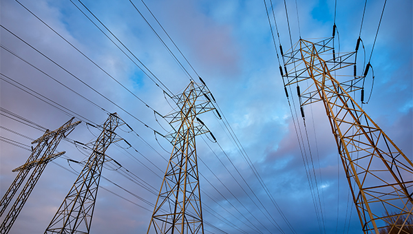 Low angle shot of powerlines at dusk