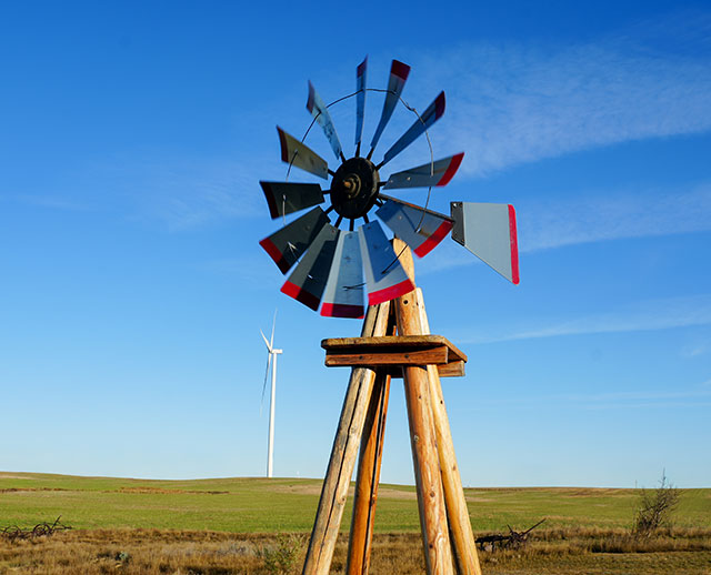 Colorful windmill with a blue sky in the background 