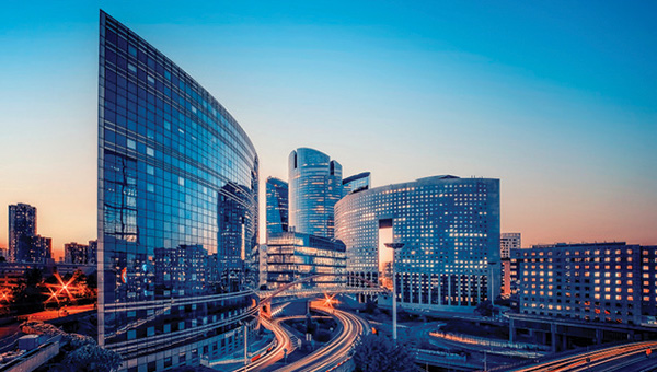 Industrial business district buildings at sunset