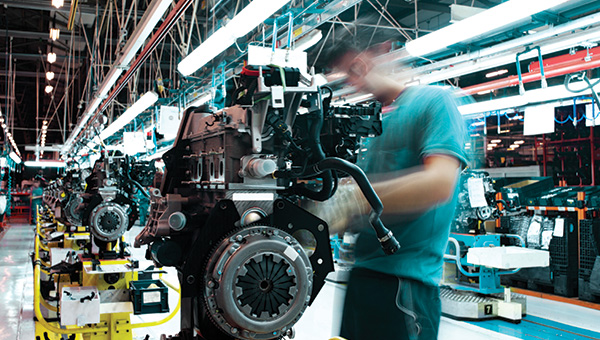 Auto mechanic assembling engine