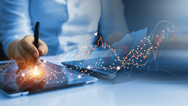 Businessman analyzing data of economic growth graph