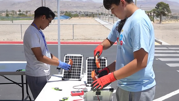 A scientist using a microscope