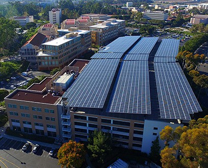 Parking building with rooftop solar panels