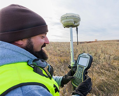 NextEra Energy Resources employee siting a wind farm